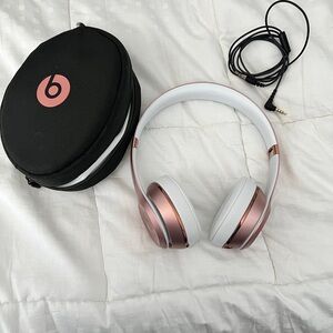 Rose Gold Beats Solo over the ear headphones